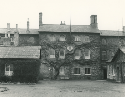 Imposing three-story brick building